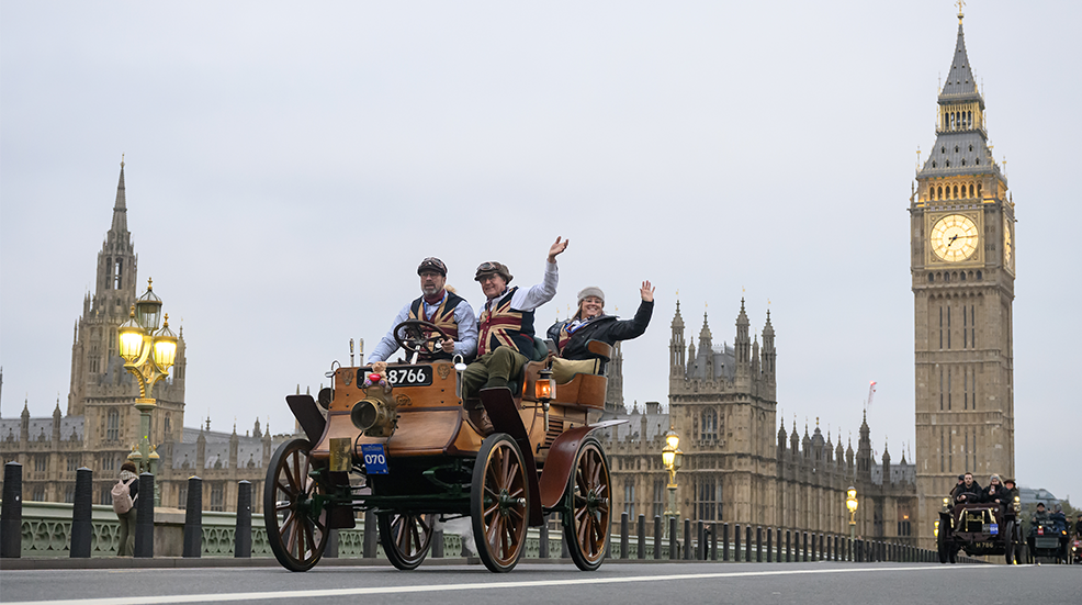 A 1901 Albion is driven across Westminster Bridge as the annual London to Brighton Veteran Car Run takes place